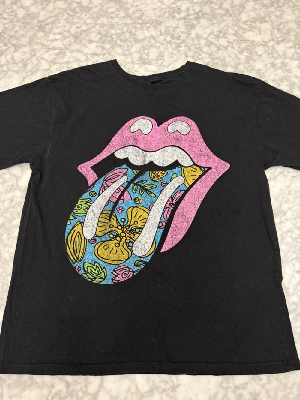 the Rolling Stones Black Tee with Pink Lips and Multicolor Floral Tongue